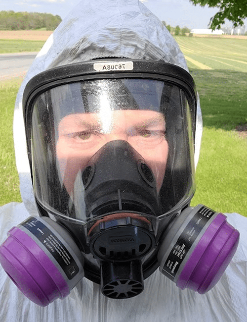 Safety first! John Driscoll of Magnum Pest Control suits up to handle a pest job Safety first! John Driscoll of Magnum Pest Control suits up to handle a pest job